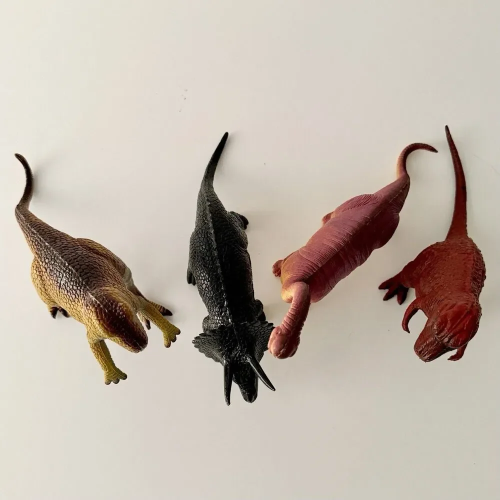 Lot of 4 Vintage Assorted Dinosaurs Plastic/Rubber Embossed - Up to 8.5